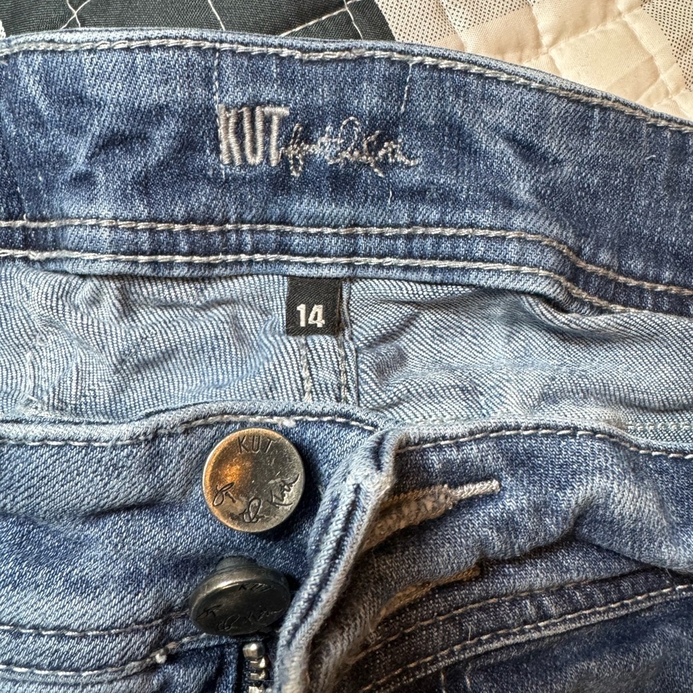 Super cute jeans. Cropped and folded hem. Size 14. Great used condition